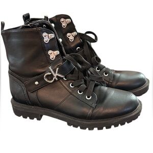 Black Leather Combat Boots with Silver Accents Calvin Klein. Darling boot.